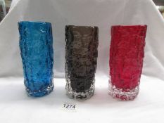 Three Whitefriars pattern 9690 7.6" bark vases - Kingfisher blue, Ruby red and Cinnamon.