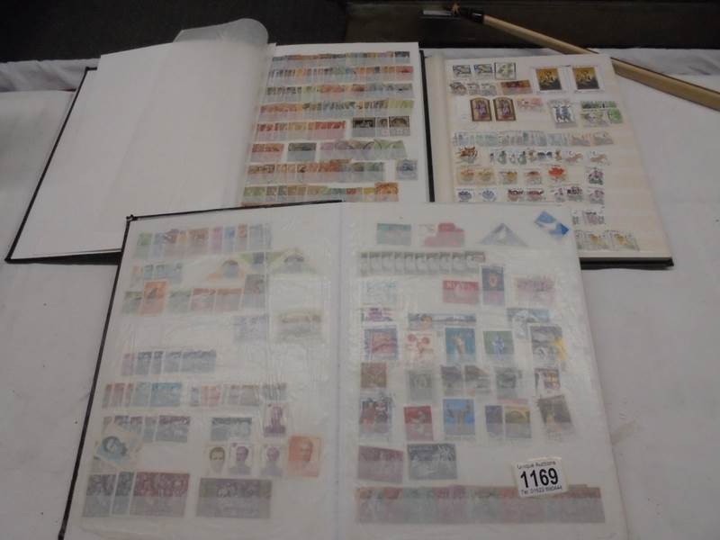 Three albums of Czech Republic, Hungary and Romania stamps.