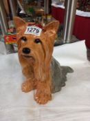 A 10.5" high Beswick Yorkshire terrier, matt finish in brown and grey (small nick out of 1 ear).