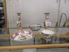 A good lot of late 18th century Chinese famille rose including a pair of vases.