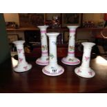 2 pairs and 1 other, 19th/20th Century continental pottery candlesticks