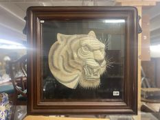 A mahogany embroidered tiger head fire screen, COLLECT ONLY.