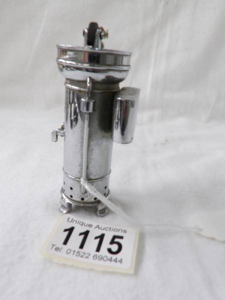 A very unusual chrome plated cigarette lighter in the form of a Stott's tea urn. Looks unused. - Image 2 of 5