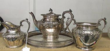 A pretty three piece silver plate tea set on tray.