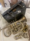 A vintage silver plated Besson cornet with case.