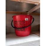 A vintage plastic embossed 'Fire Only' bucket