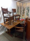 An oak refectory style table with two carvers and four dining chairs, COLLECT ONLY.