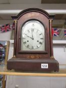 A good Edwardian inlaid mantel clock in working order.