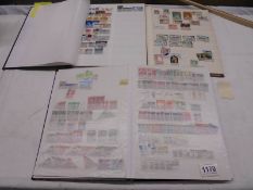 Three albums of world stamps including Pakistan, Jamaica, Portugal, Spain, India, African countries