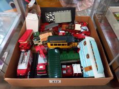 A selection of boxed Diecast fire engines and commercial vehicles including Corgi.