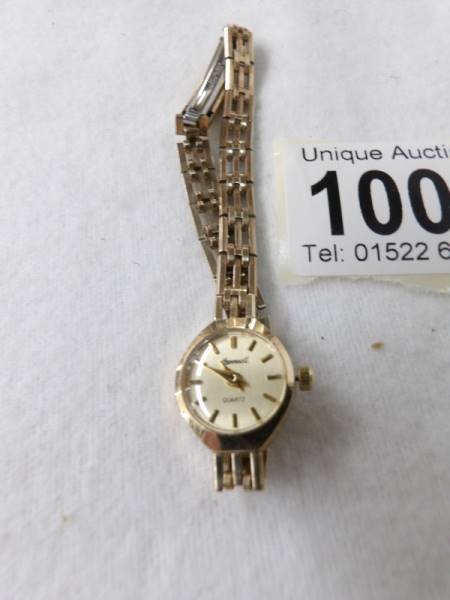 An Ingersol gold cases ladies wrist watch, needs new battery.