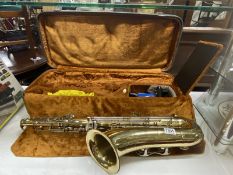 A corton saxophone with case.