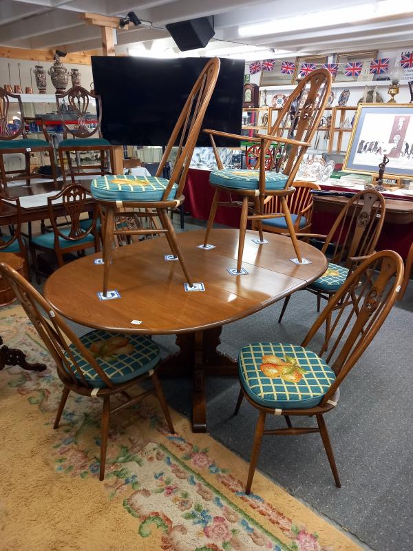 A good quality Ercol dining table with an extra leaf and six Ercol dining chairs, COLLECT ONLY. - Bild 2 aus 4