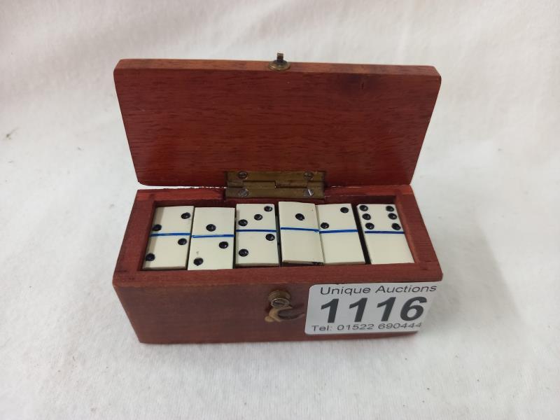 A set of mid 20th century miniature bone dominoes in original box. - Image 2 of 2