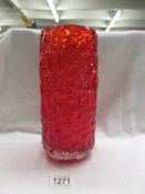 A Whitefriars Ruby Red 9734 pattern 10.5" bark vase with fluted base.