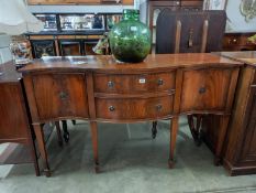 A good mahogany serpentine front sideboard in good condition, COLLECT ONLY.