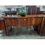 A good mahogany serpentine front sideboard in good condition, COLLECT ONLY.