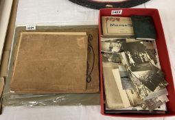 A good postacard album including military comic and topoarnphical and a box of photographs including