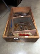 A box of machine tools including taps, etc.