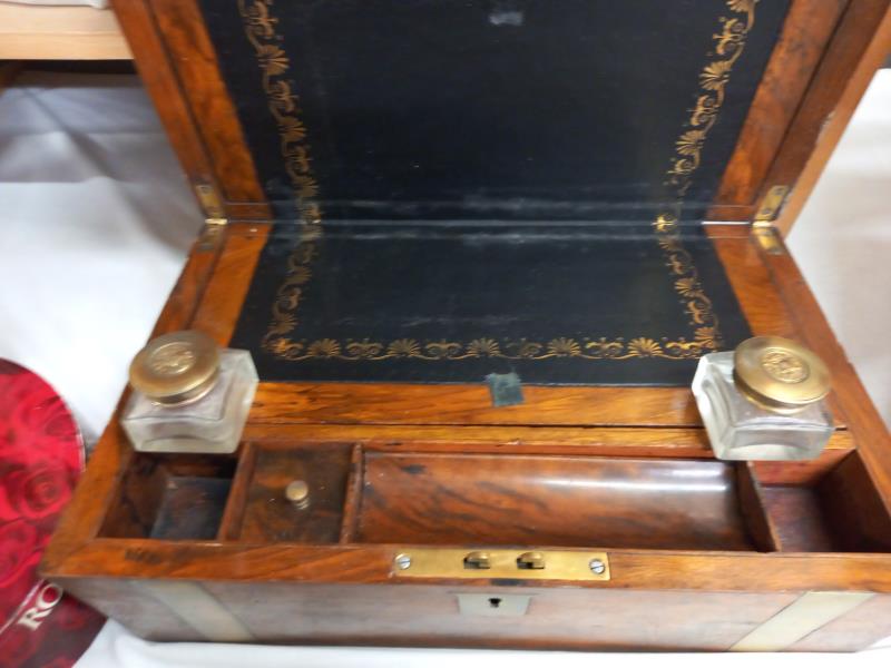 A Victorian mahogany brass banded writing box with ink bottles. - Image 3 of 3