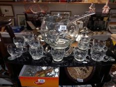 A punch bowl, ladle & 11 glasses/cups. Collect Only.
