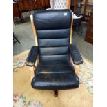 A retro Swedish model Gute-mobler Nassjo teak framed leather swivel chair.