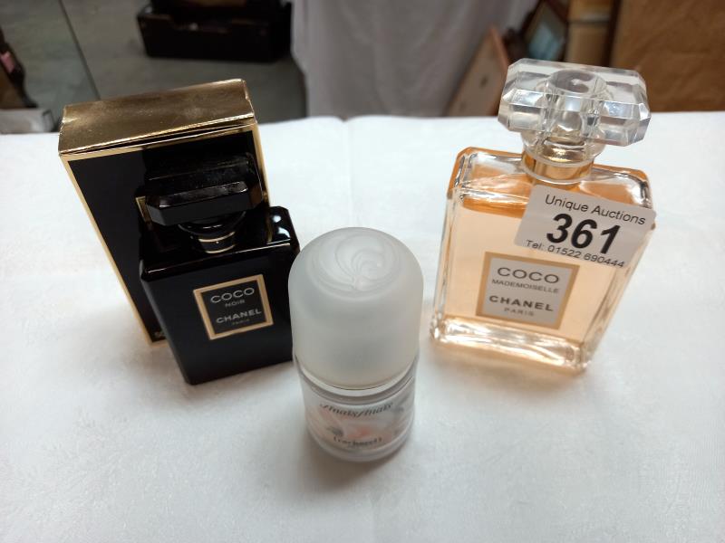A bottle of Coco Mademoiselle by Chanel 90% full. Boxed Coco Noir 25% full. Anais Anais