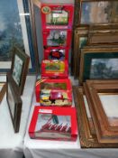 10 boxed Britain's 1/32 scale farm tractors and implements.