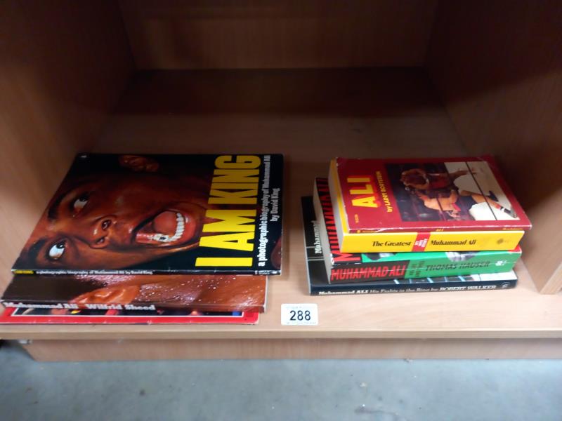 A selection of old books including Mohammed Ali, Cassius Clay.