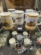 A quantity of interesting military related tankards.