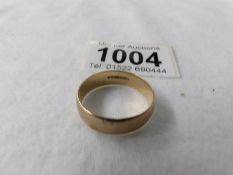 A 9ct gold wedding ring, size X, 4.9 grams.