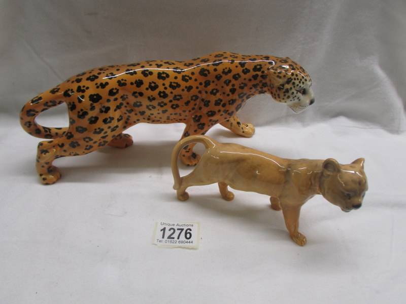 Two Beswick leopards, 8" and 6".