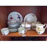 A Royal Worcester Evesham vale and Royal Grafton china.