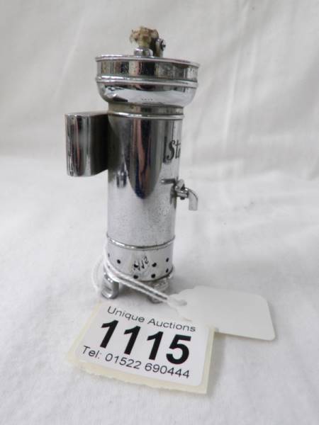 A very unusual chrome plated cigarette lighter in the form of a Stott's tea urn. Looks unused. - Image 4 of 5