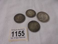 A Victorian 1890 crown, 1878 half crown and 2 1900 half crowns, approximately 68 grams.