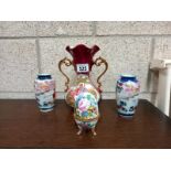 A Limoges vase and pair of Japanese vases and a porcelain egg trinket box.