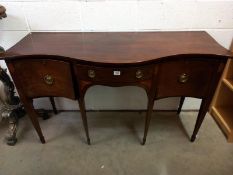 An Edwardian inlaid mahogany sideboard with serpentine front. 148cm x 59cm x Height 88cm.