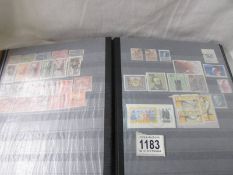 An album of world stamps including German, Australian, New Zealand etc.,