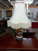 A Chinese ginger jar table lamp.