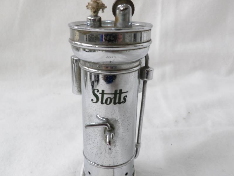 A very unusual chrome plated cigarette lighter in the form of a Stott's tea urn. Looks unused. - Image 5 of 5