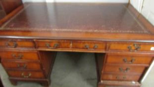A mahogany double pedestal desk with leather inset top, COLLECT ONLY.