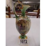 A small Royal Worcester hand painted ewer, 165 cm.