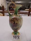 A small Royal Worcester hand painted ewer, 165 cm.