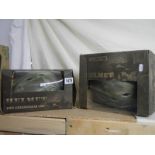 Two boxed Airsoft paintball tactical helmets.