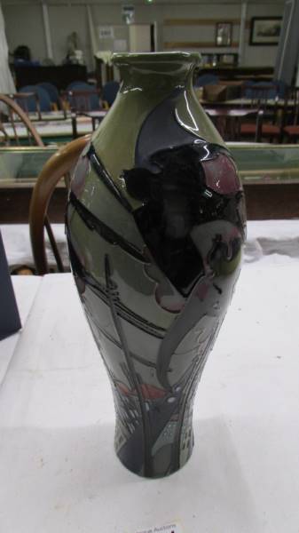 A boxed Moorcroft vase, 31 cm tall. - Image 4 of 5