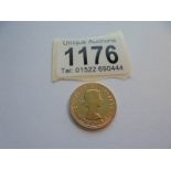 A 1968 Queen Elizabeth II gold sovereign.