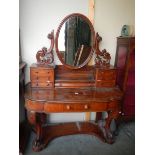 A Victorian mahogany 'Duchy' dressing table. COLLECT ONLY.