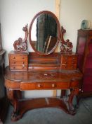 A Victorian mahogany 'Duchy' dressing table. COLLECT ONLY.