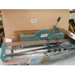 A boxed mitre saw.