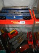 A boxed Tri-ang R445, R446, R447 transcontinental, R 253 Diesel shunter etc., two shelves.